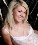 Ashlee lounges by the pool in a very sexy lace outfit barely covering her tight body