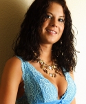 Sexy teen Erin poses in a lowcut top that makes her perky tits look amazing